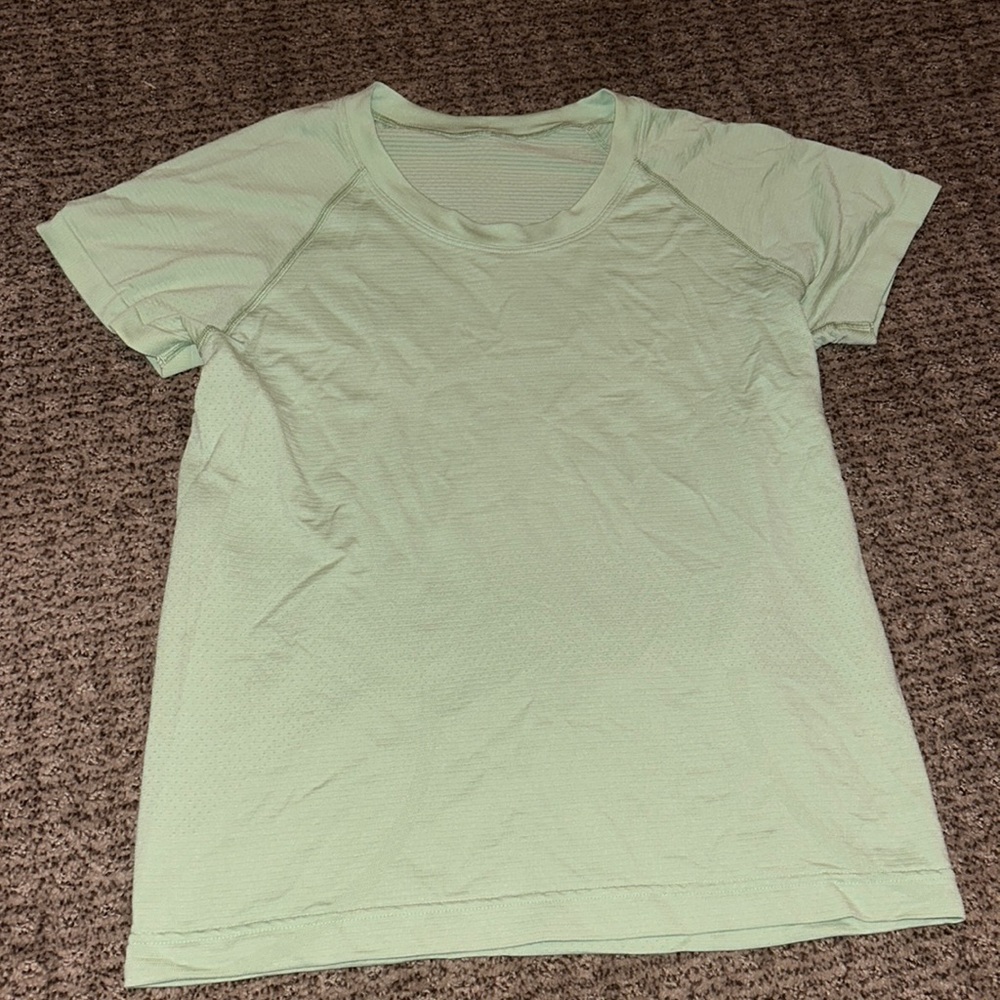 very pretty green lululemon shirt!